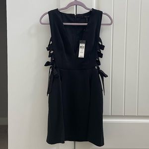 Bcbg dress with tie cut out sides